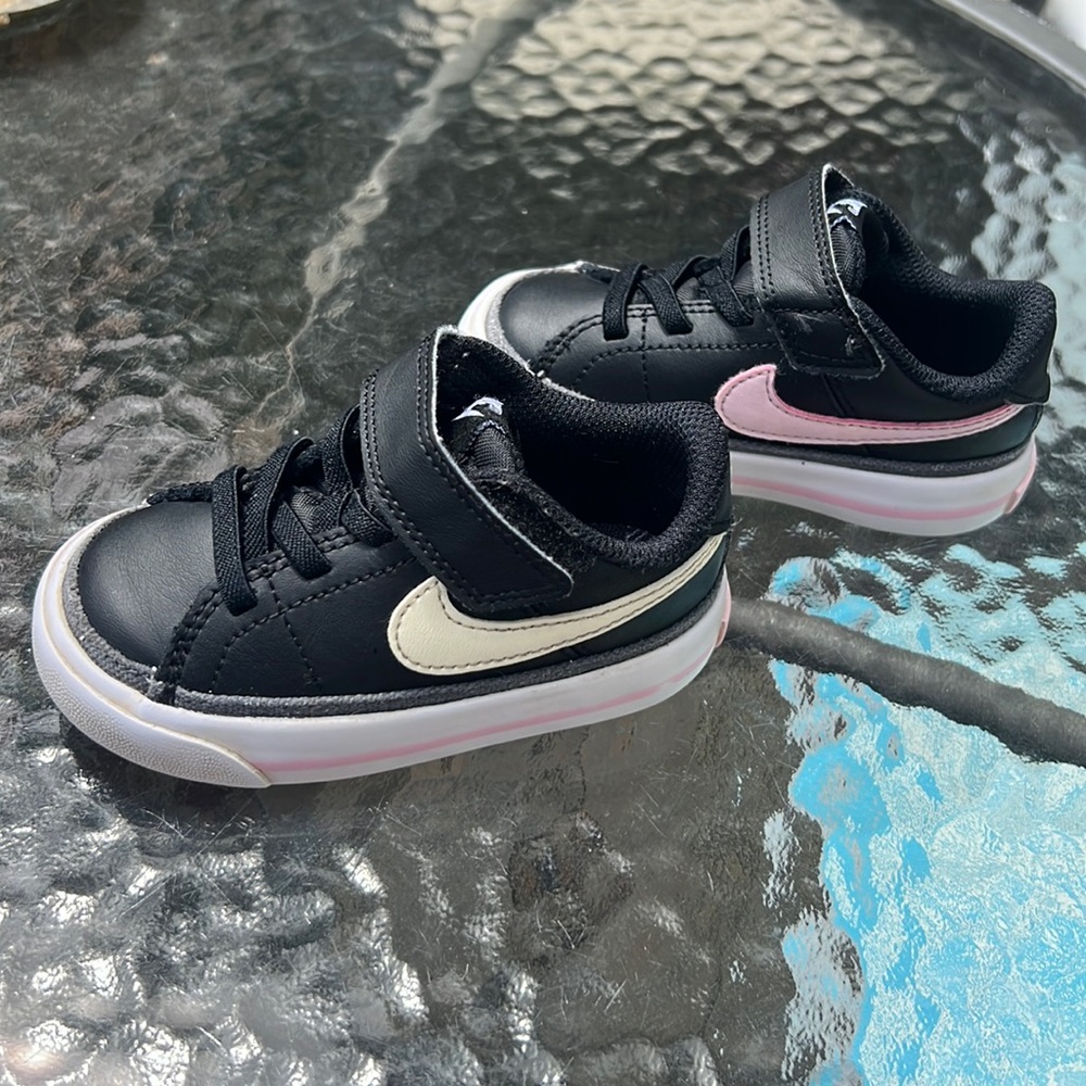 Black, pink, and cream Nike low top blazers
